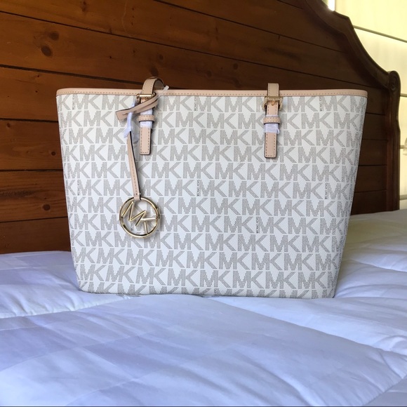 Michael Kors Handbags - Michael Kors Travel Jet Set tote Vanilla brown